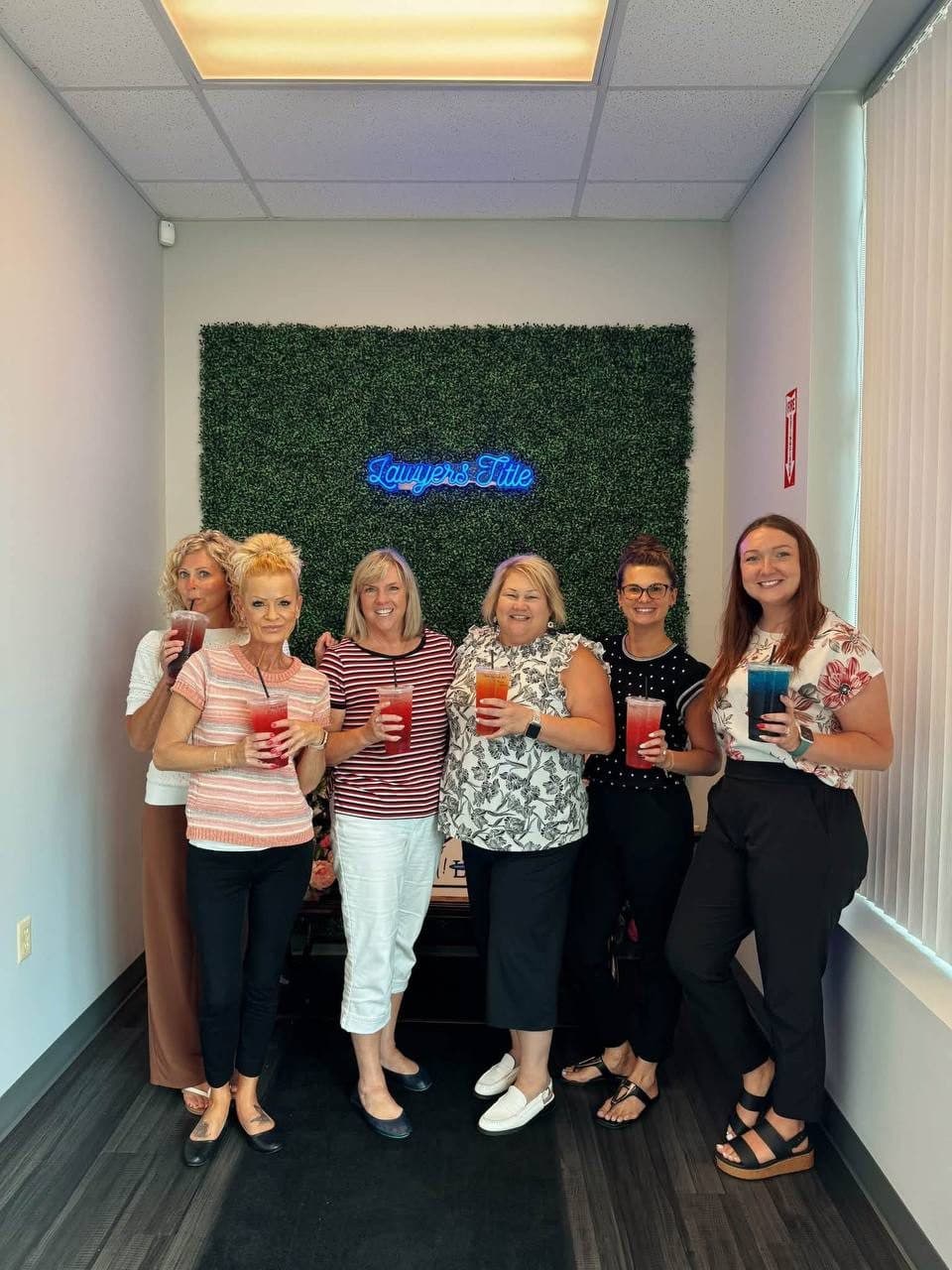 The Lawyers Title office crew enjoying their Flourish teas together